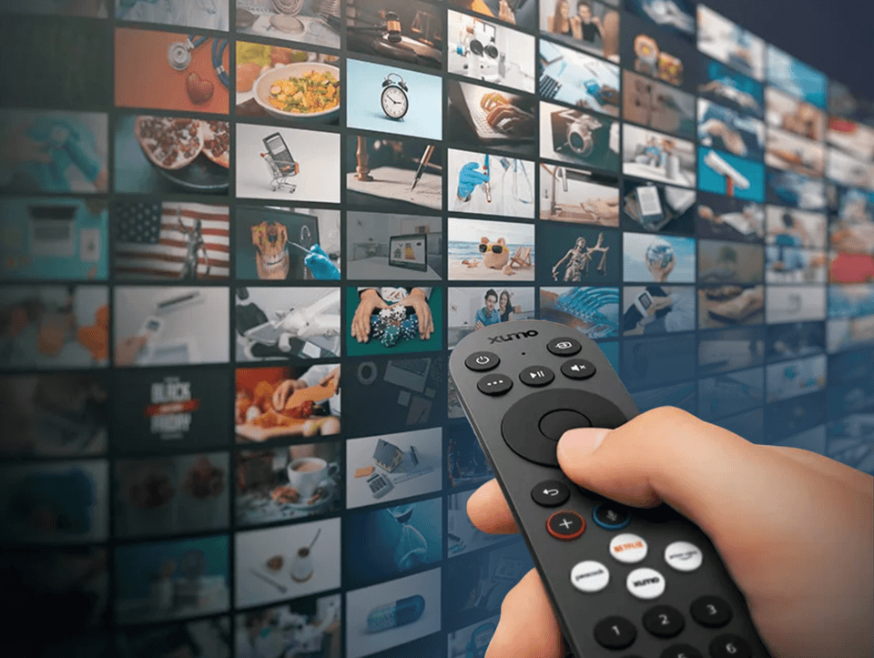 man holding xumo remote