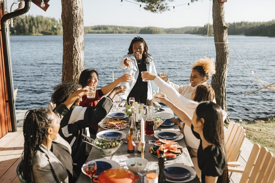 friends drinking at dinner table