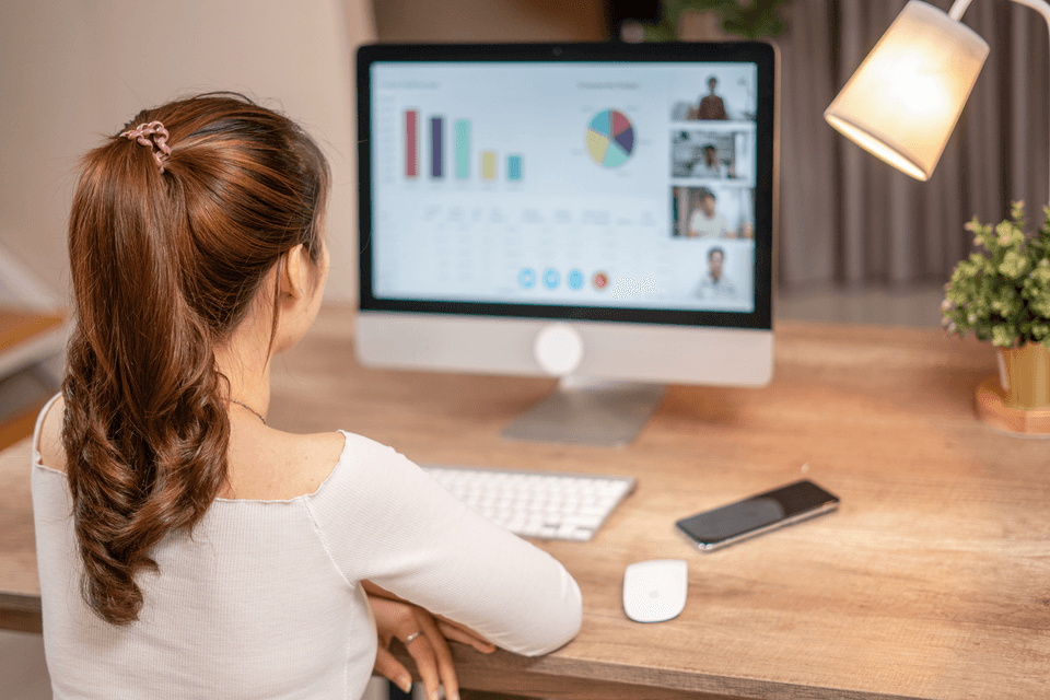 woman watching a webinar