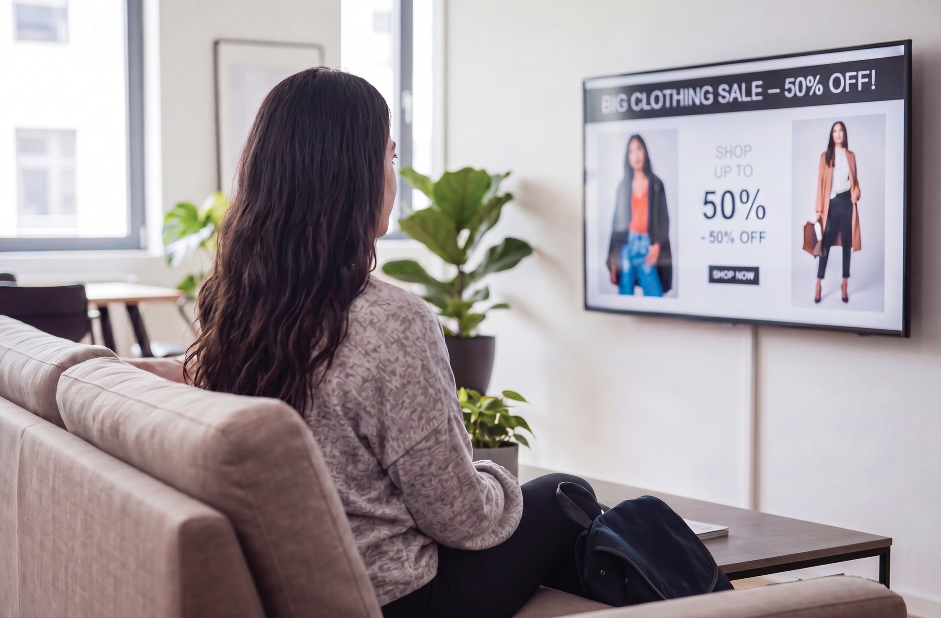 ai created image of lady seeing an ad on home tv